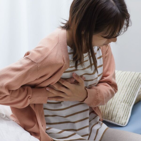 woman with pain from pumping