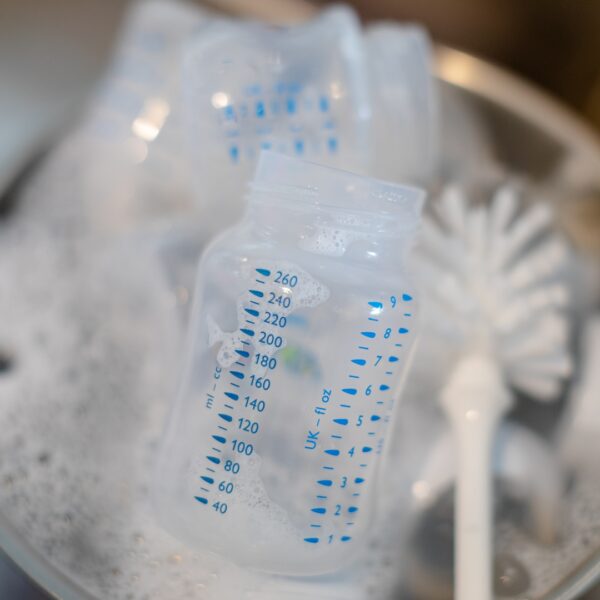 bottles being cleaned and sanitized