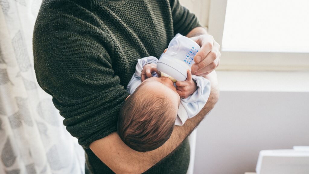 dad bottle feeding